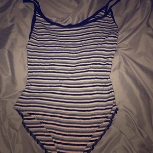 Gray/white/black striped leotard
